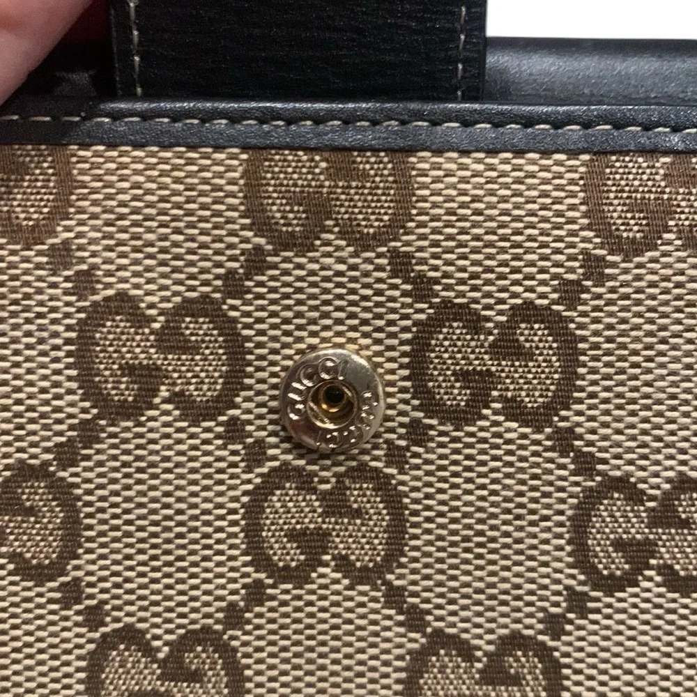 Gucci gold heart canvas and leather bifold wallet